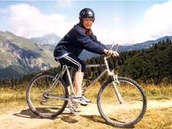 Girl cycling in the Alp's near Morzine