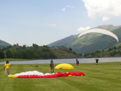 Paragliders landing near Saint-Lary-Soulan in the Pyrenees France